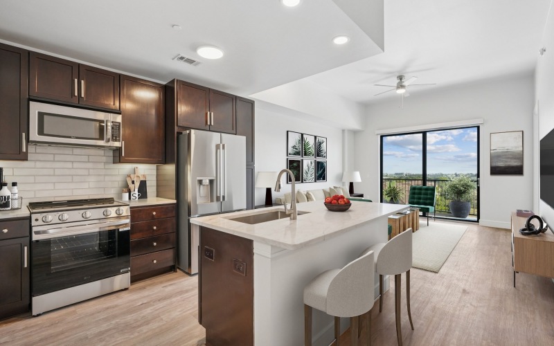 a kitchen with wood cabinets
